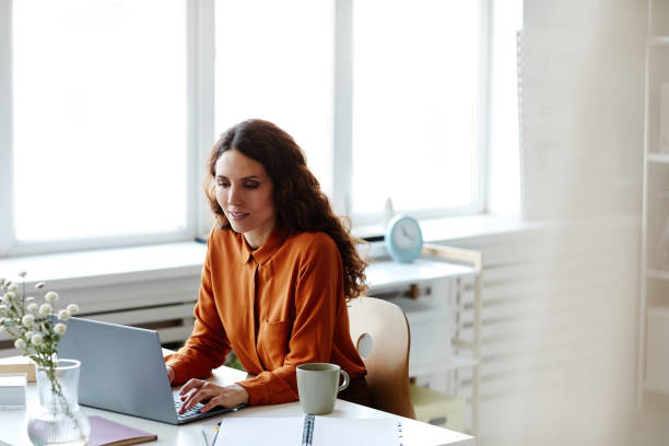 istock Stylish Woman Working In Office 1399751683