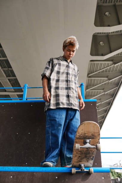 istock Boy Skateboarding on Ramp 1399752812