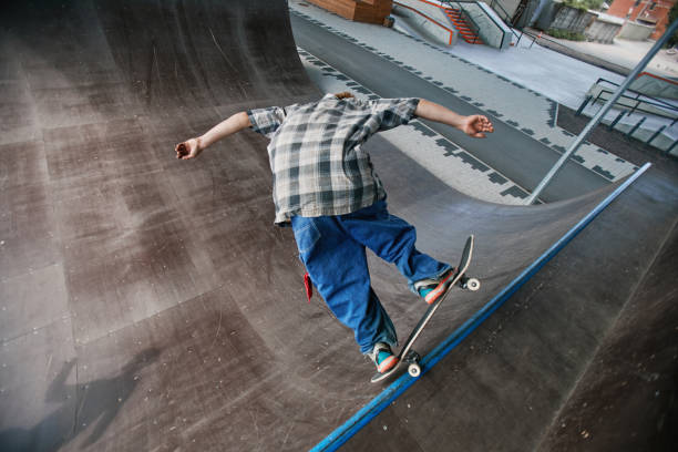 istock Young Skater Action Shot 1399752827