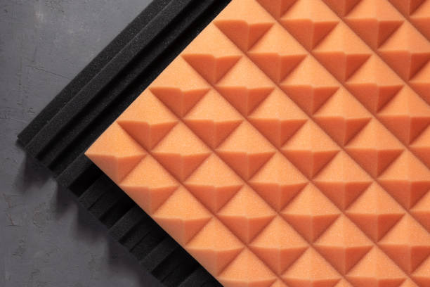 istock Acoustic foam material on concrete wall background texture. Foam rubber panel for record studio 1399753080