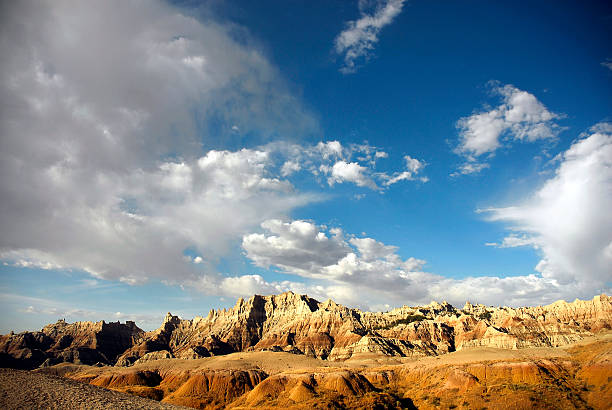 istock Low view of deserted badlands with clouds floating above 139975336