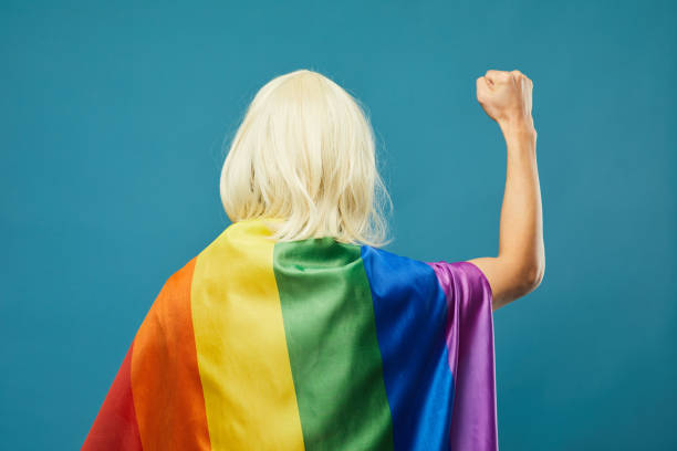 istock Person Wearing LGBTQ Flag 1399753801