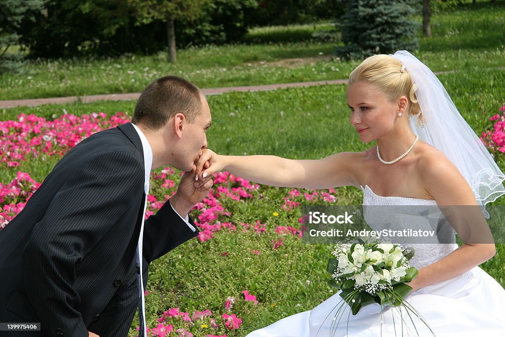 Happy married Happy married. Newlywedses on walk in park. This photo is not correction. Adult Stock Photo