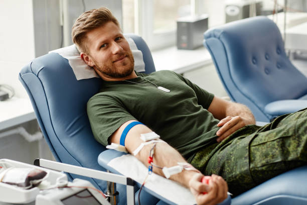 istock Smiling Soldier Donating Blood 1399755056