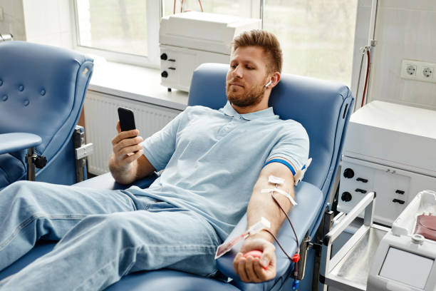 istock Man Relaxing in Blood Donation 1399755105
