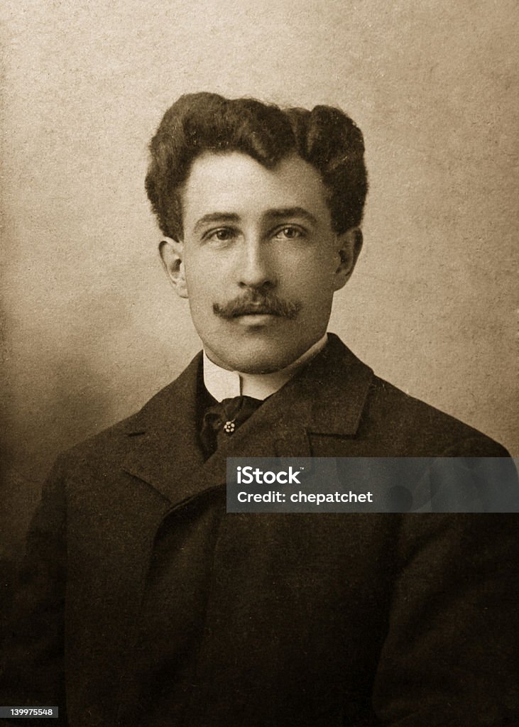 sam antique photograph of man in suit coat with moustache Portrait Stock Photo