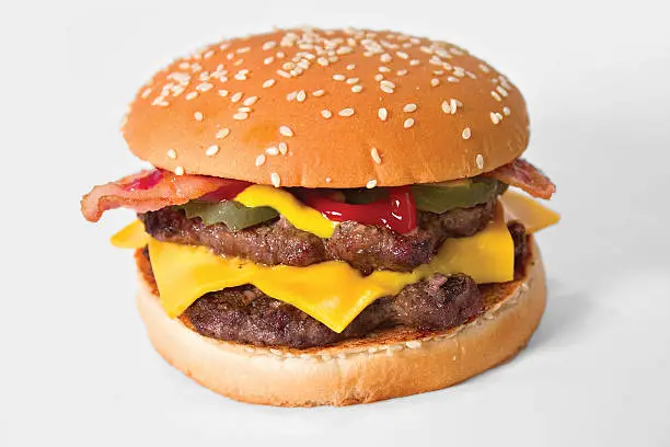 Photo of Close-up of a double bacon cheeseburger