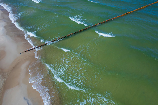 Historic fishing pier at the gulf of mexico coast in Naples. Florida, United States