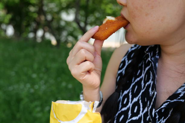 istock Young woman having a snack 1399757953