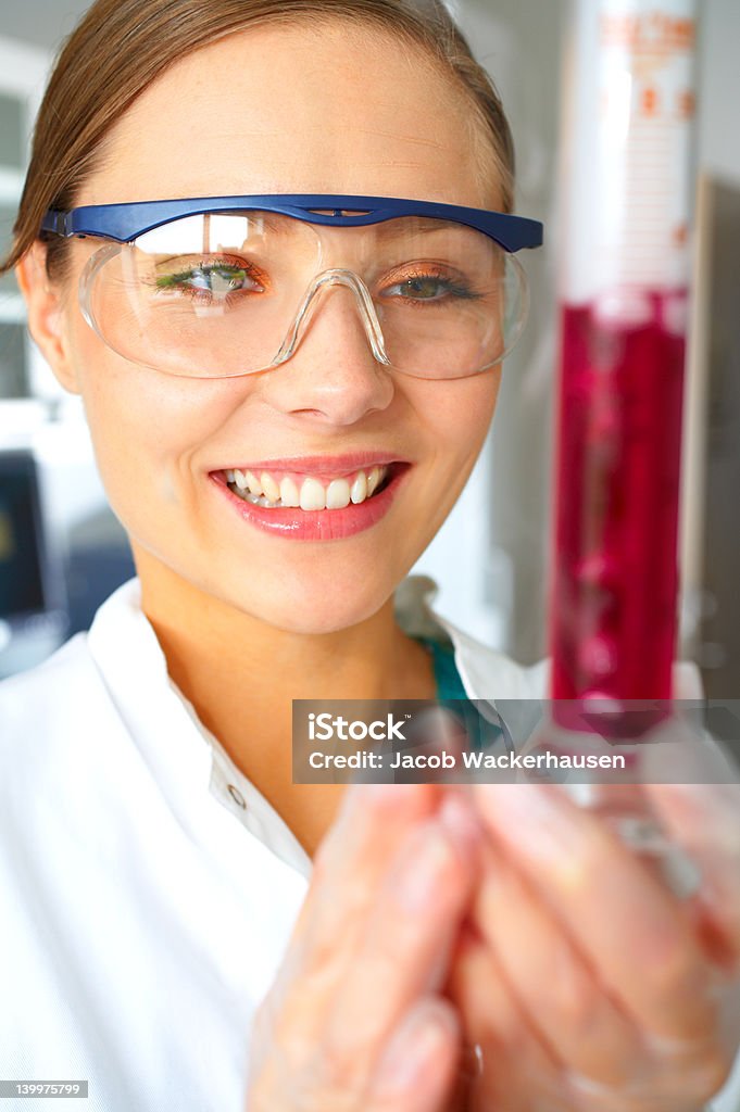 Happy young female scientist working 20-24 Years Stock Photo