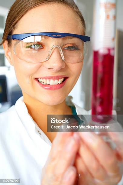 Happy Young Female Scientist Working Stock Photo - Download Image Now - 20-24 Years, Adult, Adults Only