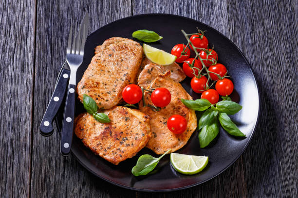 istock tomato basil pesto fried pork cutlets on plate 1399758000