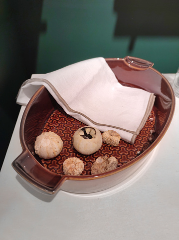 decorative mushrooms and ceramic bowl