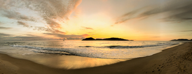 Dawn on Campeche beach. Dawn with intense colors at Campeche beach - Florianópolis - Santa Catarina