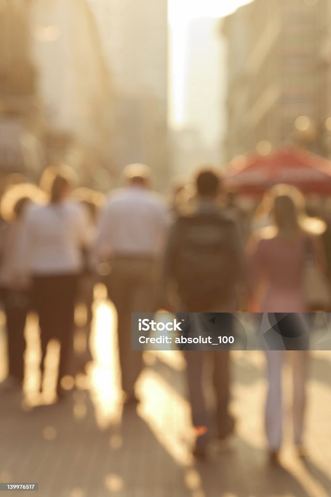 Blurred image of a busy city street at sunset Busy european street at sunset. Purposely defocused using lenses.  Activity Stock Photo