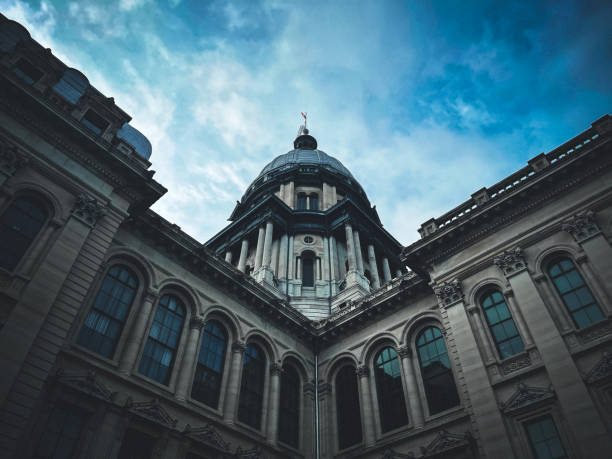 Views of the Illinois State Capitol Building Rear view of the Illinois State Capitol Building in Springfield, Illinois, USA. Looking up a partial view of the building against a bright blue cloudscape. illinois state capitol stock pictures, royalty-free photos & images