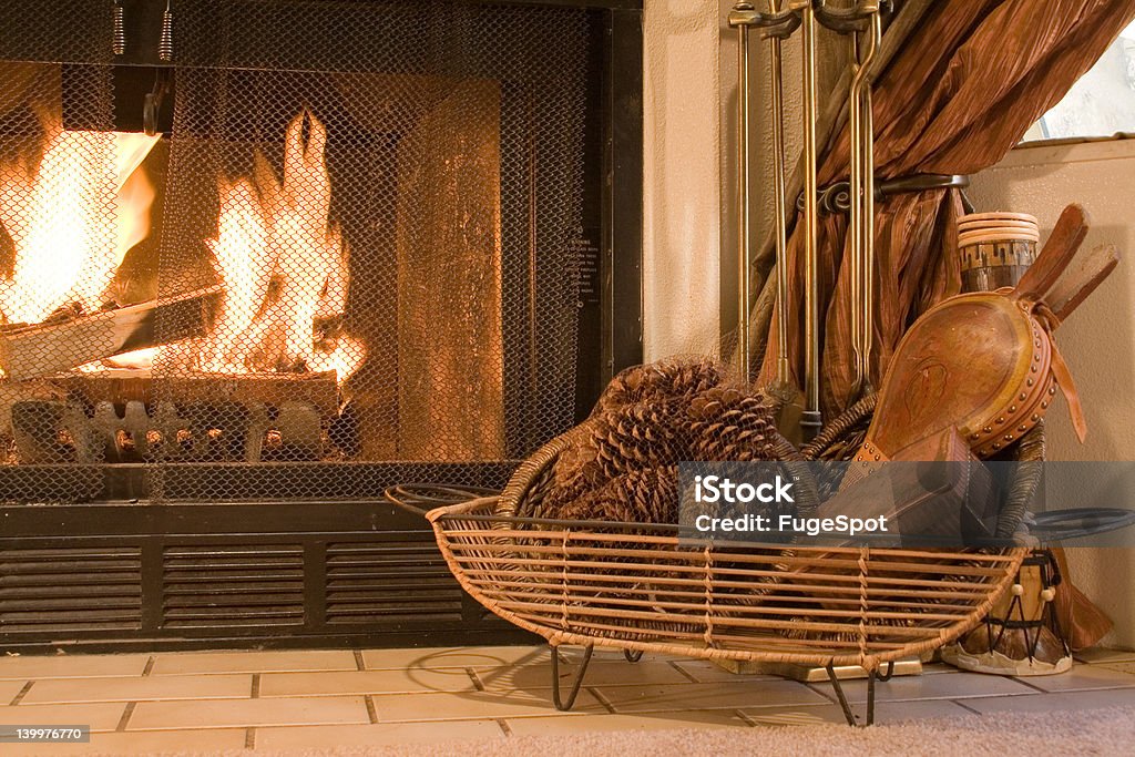 Fall Fireplace Setting with FIre Fireplace with autumn decorations. Autumn Stock Photo