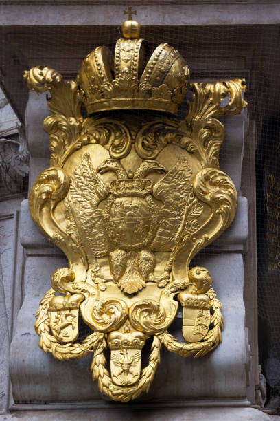Coat of arms of the Habsburg monarchy at the Hofburg in Vienna Coat of arms of the Habsburg monarchy at the Hofburg in Vienna habsburg dynasty stock pictures, royalty-free photos & images