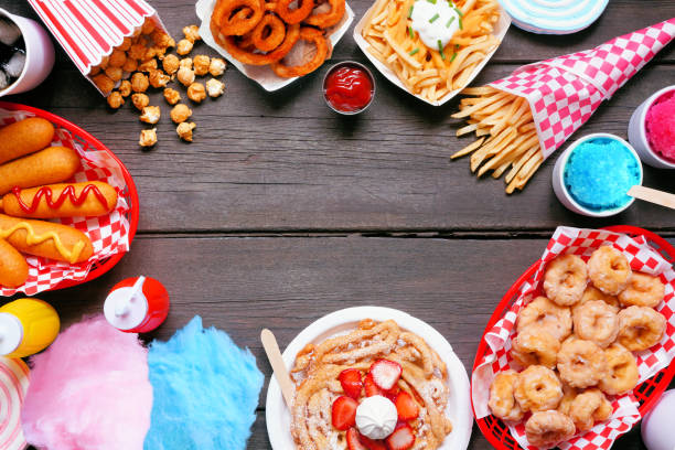 istock Carnival theme food frame over a dark wood background 1399767925
