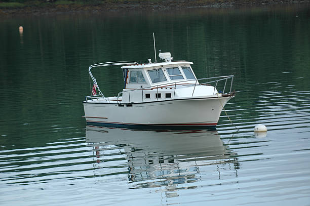 anchored boat stock photo