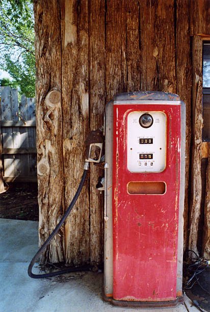 istock Antique Gas Pump With Log Wall 139976991