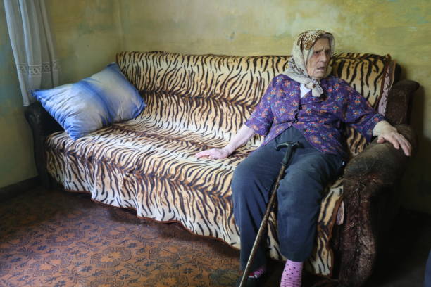 istock Granny sitting alone in her house 1399771040