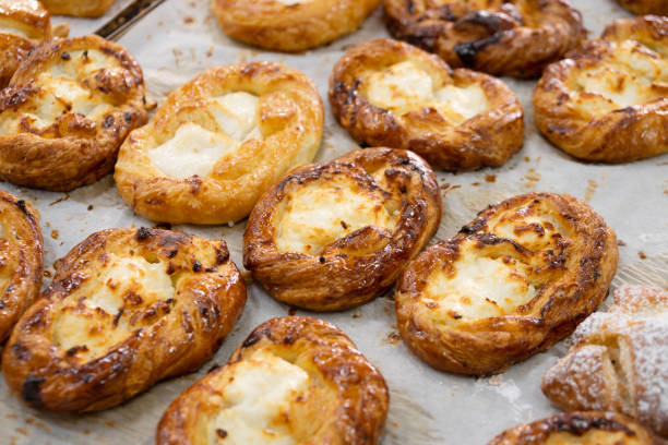 istock Tasty just baked buns with cottage cheese on the bakery counter 1399772427