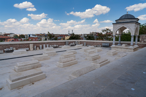 Konya, Turkey - May 12, 2022: Alâeddin Mosque was built in the 13th century during the Anatolian Seljuk period. Sultan II Kilicarslan Tomb is located in the courtyard of the mosque.