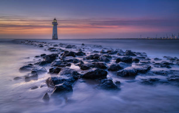 istock Perch Rock Lighthouse with rocks in the foreground 1399777514