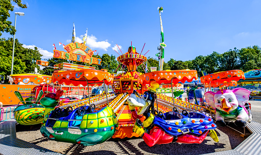 Freising, Germany - September 4: typical fairground ride at a travelling annual fair in Freising on September 4, 2021