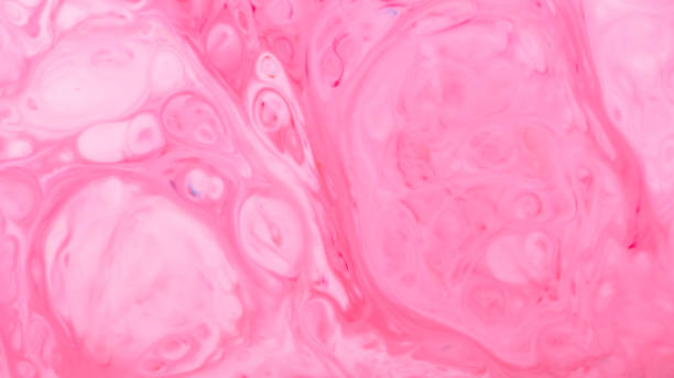 istock Light pink fluid art background. Blurred pink shapes on a liquid surface. Abstract wallpaper of soft pink shades 1399782407