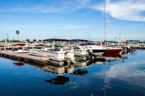 Blue skies over blue waters in this crowded marina on East Lake Toho in St Cloud, Florida