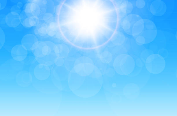 istock Summer sunny background, blue sky with glaring sun and blurry bokeh 1399782784
