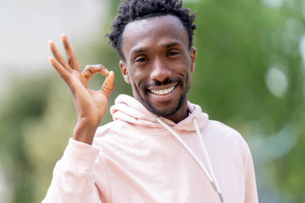istock African man with ok gesture on the street 1399782824