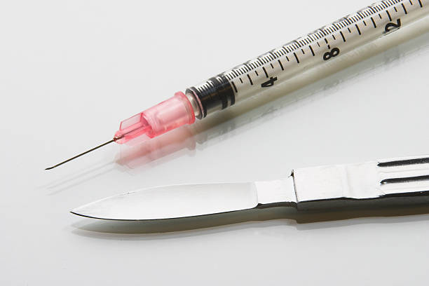 Syringe or Scalpel stock photo