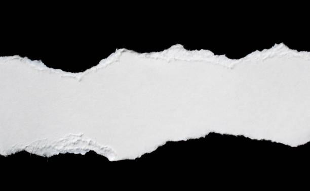 istock a white piece of paper on a black isolated background 1399784343