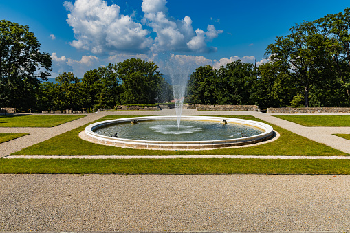 Kamieniec Zabkowicki, Poland - June 2021: Big fountain in front of old renovated Marianna Orańska's Palace