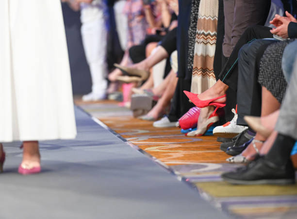 istock Audience sitting along the catwalk 1399787685