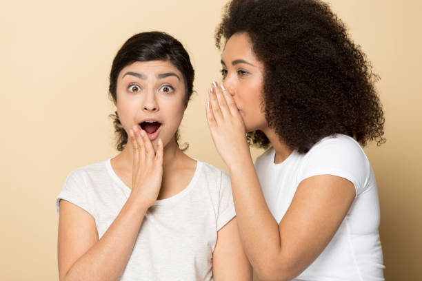 istock Multiracial girlfriends smile share good deal offer 1399788080