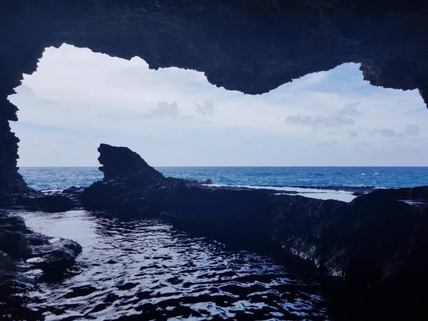 istock Tropical cave with pool of water 1399792478