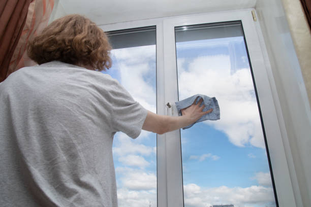 istock Washing the windows of the house 1399796929