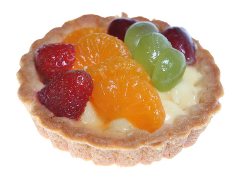 Delicious fruit tart with grapes, strawberries and mandarin slices