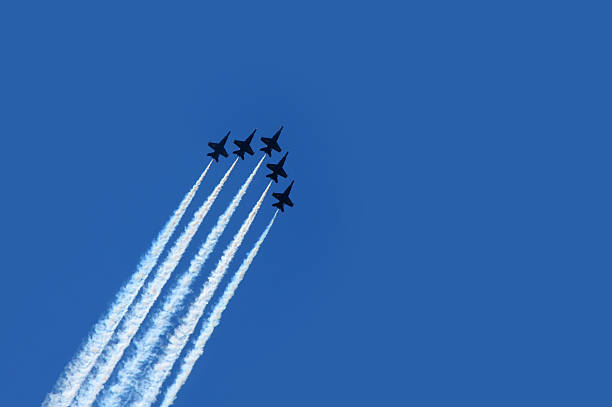 istock Five planes flying in formation for an air show 139979770