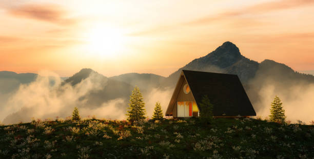 Fog covering the mountains along the highway in Switzerland, across the Alps.\nWe also see some quintessential Swiss houses, these are located all along the highway  across the Alps.