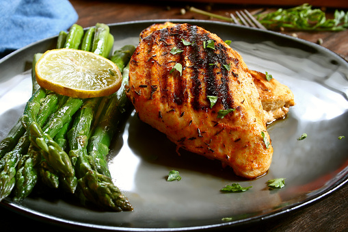 Marinated grilled chicken breast and asparagus