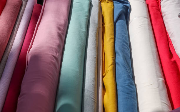 istock Detailed close up view on samples of cloth and fabrics in different colors found at a fabrics market 1399800669
