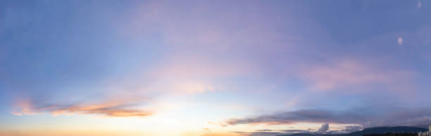 istock Panoramic View of Cloudscape during a colorful sunset or sunrise. 1399801147