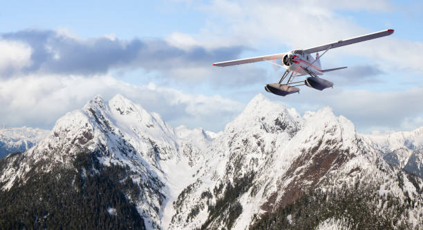 istock Seaplane flying over the Rocky Mountains. 1399801922