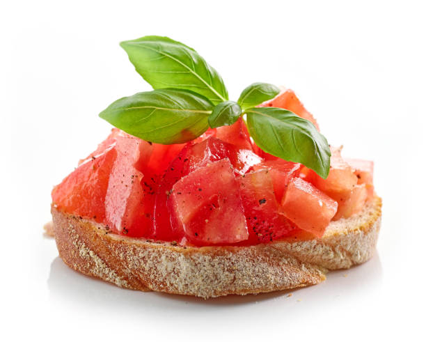 bruschetta with tomato bruschetta with tomato and basil isolated on white background bruschetta stock pictures, royalty-free photos & images