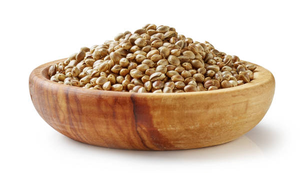 hemp seeds in olive wood bowl